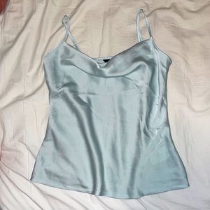 New, never worn. Adjustable straps. Silky smooth. Clean.